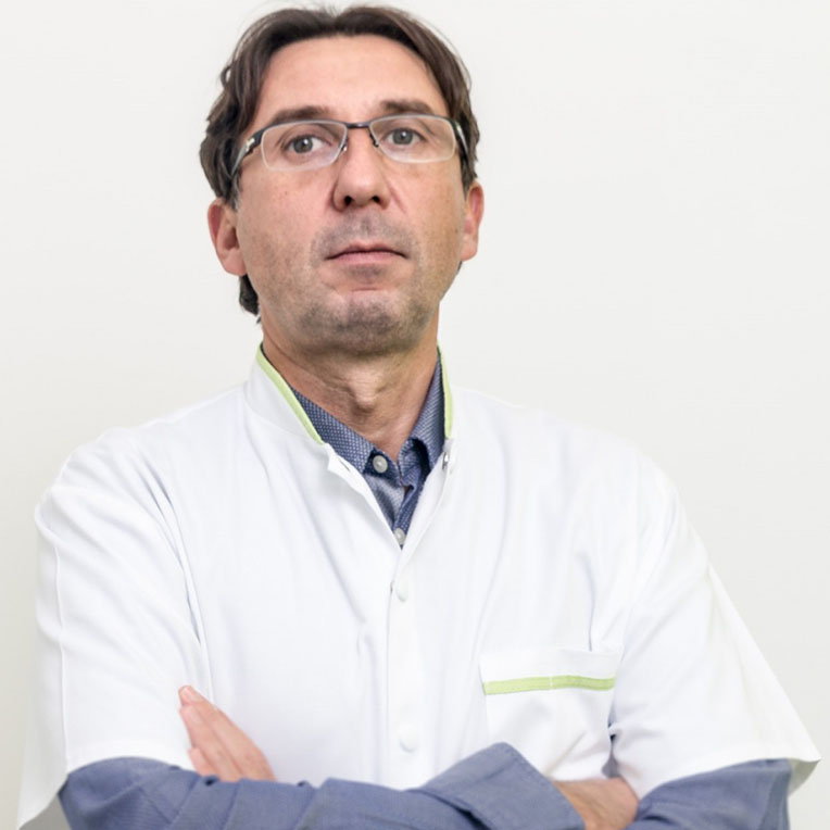 Dr.  Cezar Stroescu
